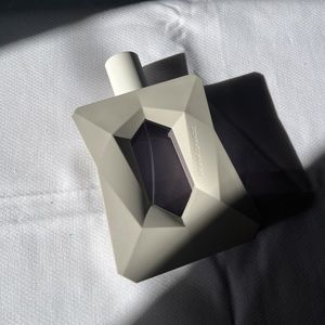 Ariana grande perfume god is a woman